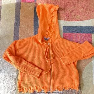 Woman’s Threndy Treads orange hoodie sweater